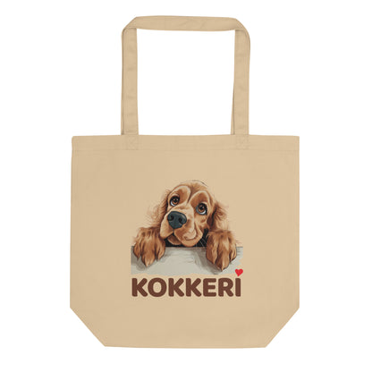 Ekologinen kangaskassi, jossa cockerspanielin kuva ja teksti "Kokkeri" punaisella sydämellä.