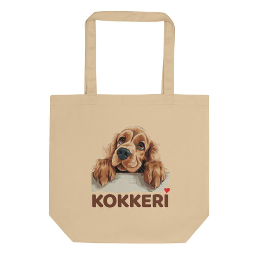 Ekologinen kangaskassi, jossa cockerspanielin kuva ja teksti "Kokkeri" punaisella sydämellä.