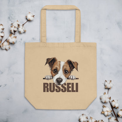 Jackrussellinterrieri kangaskassi pöydällä.