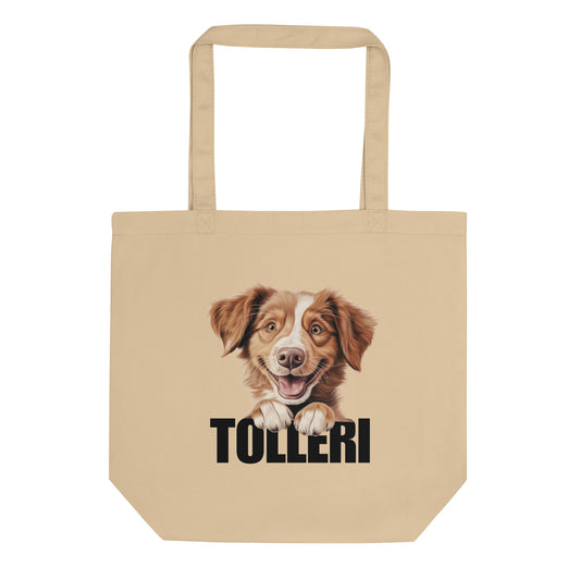Novascotiannoutaja kangaskassi, jossa iloisen koiran kuva ja musta teksti "tolleri".