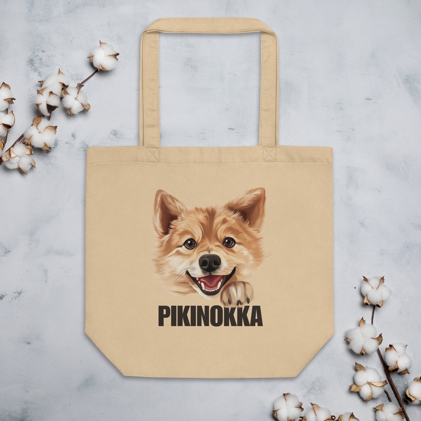 Suomenpystykorva kangaskassi pikinokka-designilla ja koristeita.