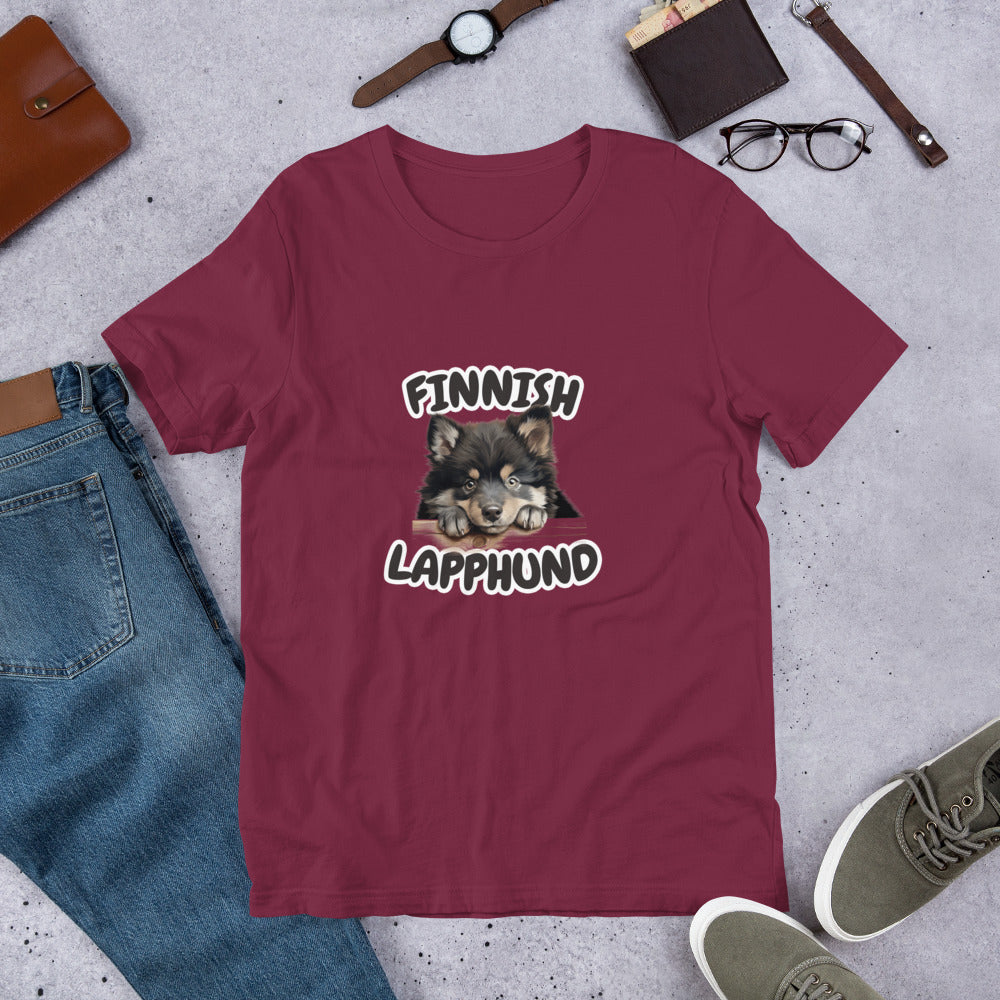 Kastanjanruskea t-paita, jossa kurkkaavan suomenlapinkoiran kuva ja tumma teksti "Finnish Lapphund".