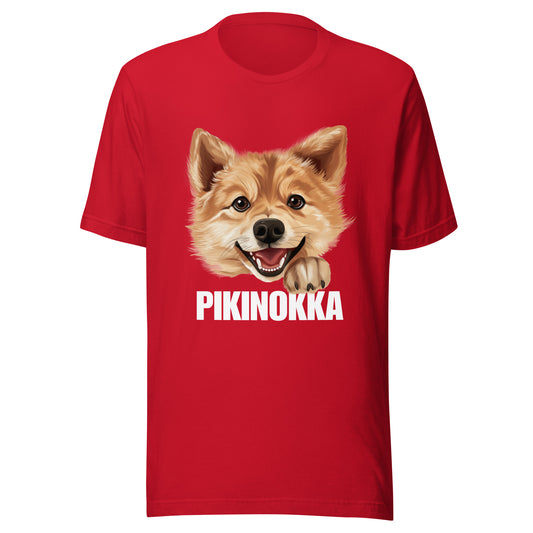 Punainen t-paita, jossa suomenpystykorvan kuva ja valkoinen teksti "pikinokka".