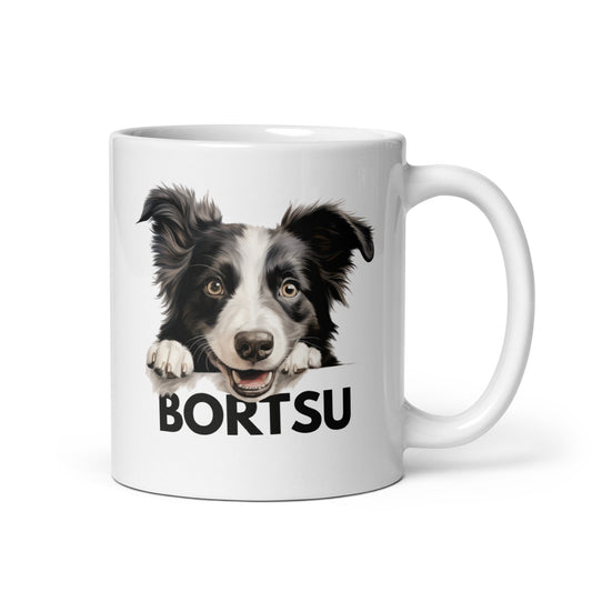 Valkoinen muki, jossa bordercollien kuva ja teksti "bortsu".
